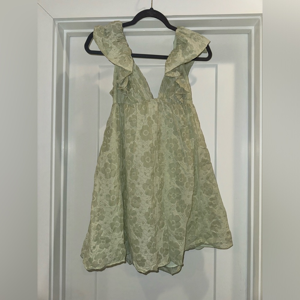 Green ruffle sleeve dress